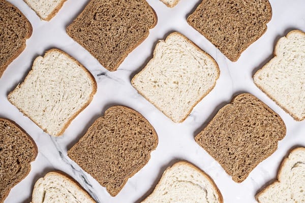 Food inspection agency claims that metal pieces in bread are not ‘high-risk’; fails to notify grocers of recall